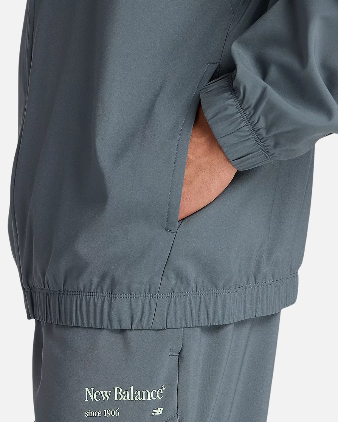 Veste à capuche New Balance Reimagined Woven - Gris