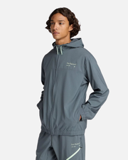 Veste à capuche New Balance Reimagined Woven - Gris