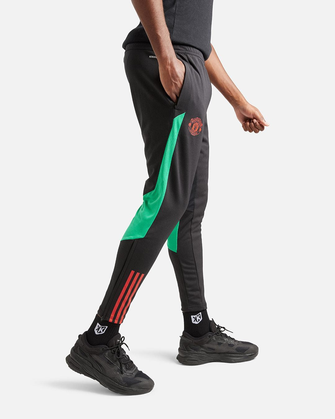 Pantalon d'entrainement Manchester United - Noir/Rouge/Vert