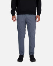Pantalon New Balance AC Tapered - Gris